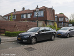 Talmastraat zicht op achterkant huizen Dr. Schaepmanstraat. Let op de bijzondere kapvorm op de hoek.
<br/>
Corrie Groen- Pickhard, 2017-05-06